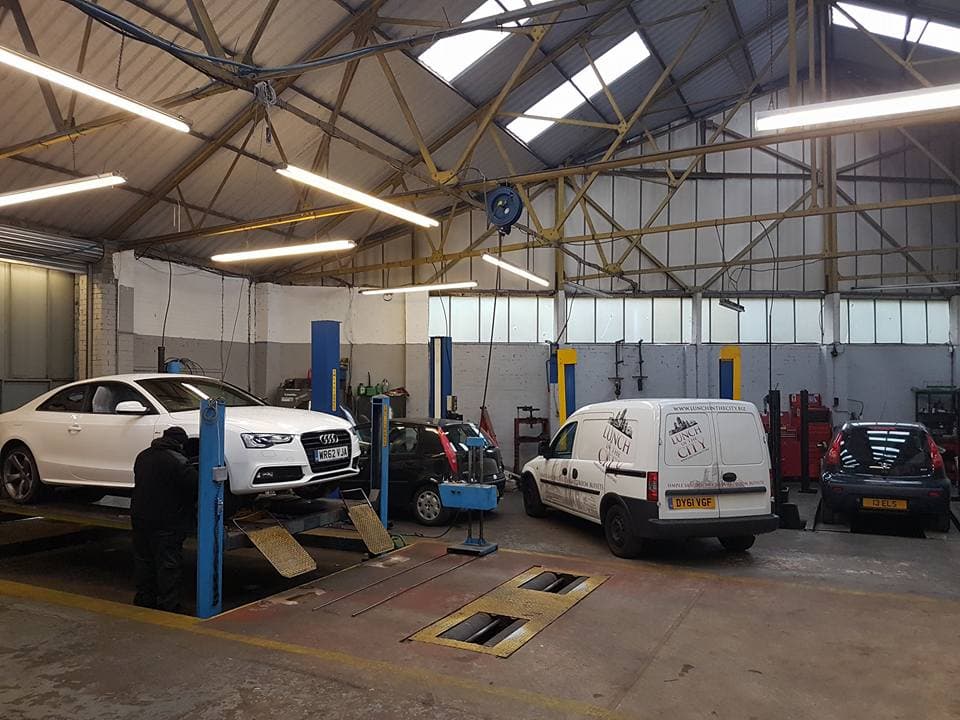 Mechanic working on a car