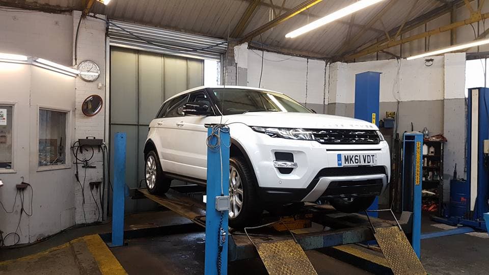Mechanic working on a car